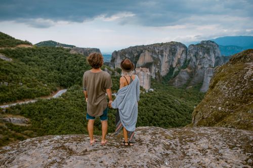 Couple looking out mountains